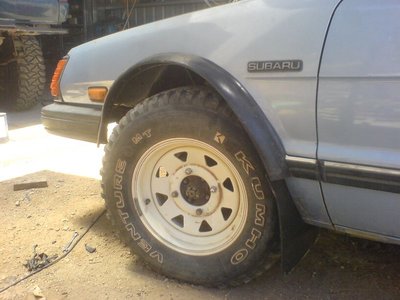 83sedan_rubberflares_mudflap1.jpg