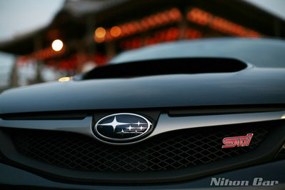 Subaru badge & STi badge.jpg